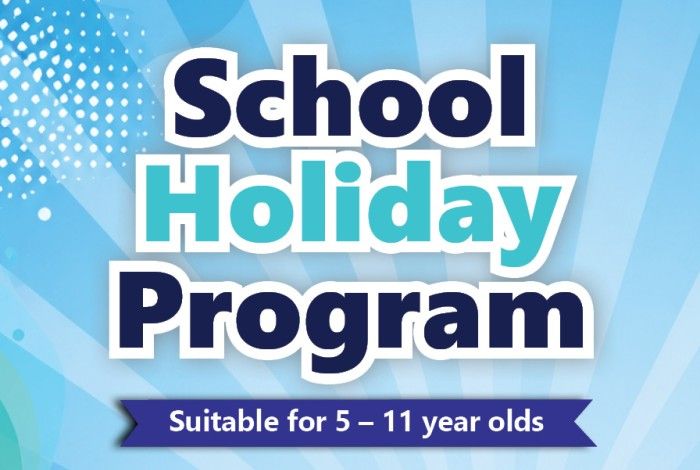 School Holiday Program promotional banner featuring large blue and turquoise text on a light blue abstract background. The banner reads "School Holiday Program" with a ribbon underneath stating "Suitable for 5–11 year olds." Decorative dot patterns and sunburst-style graphics appear in the background.